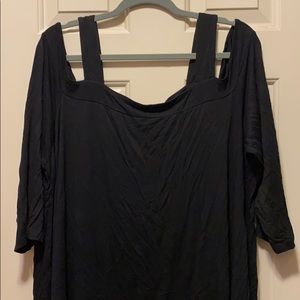 Off the shoulder 3/4 inch sleeve black top.